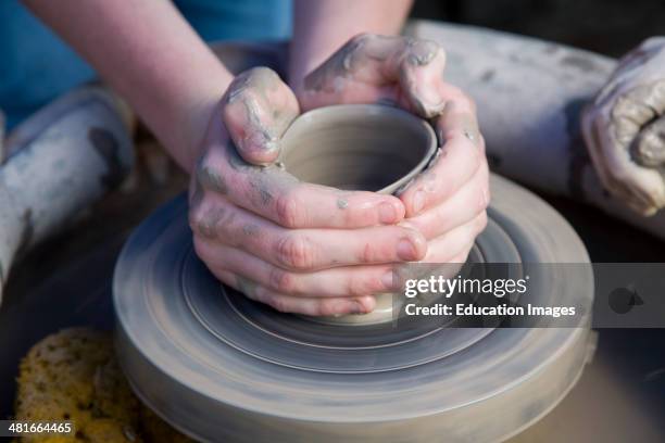 Pottery making display at country craft event, Shottisham, Suffolk, England.