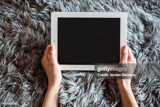 female with tablet computer. - shagpile stock pictures, royalty-free photos & images