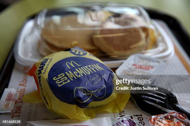 McDonald's "Big Breakfast" and Egg McMuffin are displayed at a McDonald's restaurant on July 23, 2015 in Fairfield, California. McDonald's has been...