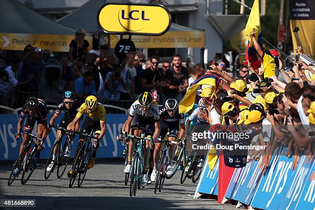 The yellow jersey group sprints toward the finish including Warren Barguil of France riding for Giant-Alpecin, Geraint Thomas of Great Britain riding...