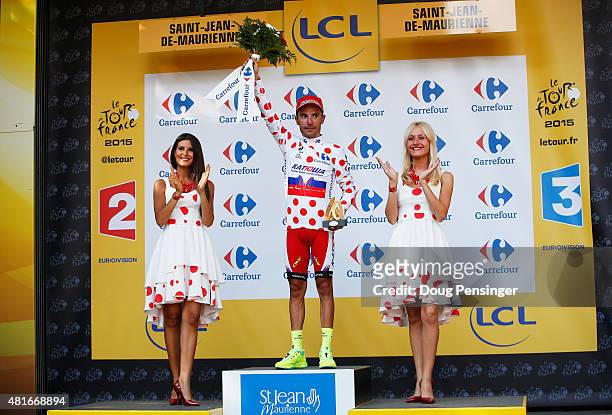 Joaquim Rodriguez of Spain and Team Katusha stands on the podium wearing the King of the Mountains jersey after Stage Eighteen of the 2015 Tour de...