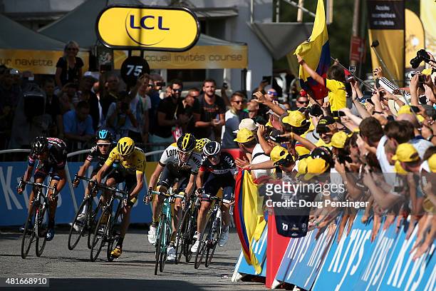 The yellow jersey group sprints toward the finish including Warren Barguil of France riding for Giant-Alpecin, Geraint Thomas of Great Britain riding...