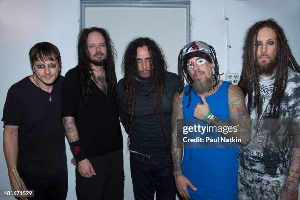 Group portrait of the group Korn as they pose backstage at the Riviera Theater, Chicago, Illinois, October 2, 2013. Pictured are, from left, Ray...