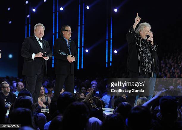 Blair Thornton, Robbie Bachman, Randy Bachman and Fred Turner receive their award at the 2014 Juno Awards held at the MTS Centre on March 30, 2014 in...