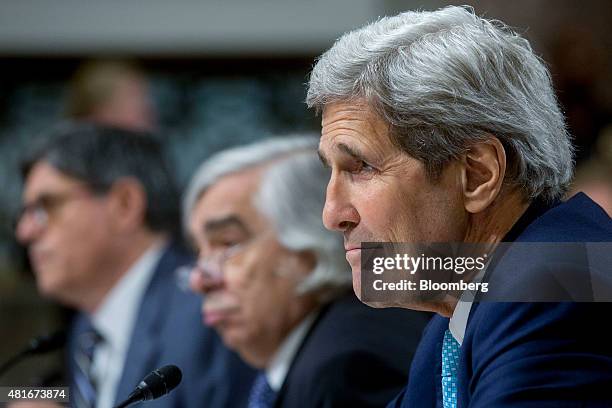 John Kerry, U.S. Secretary of state, from right, Ernest Moniz, U.S. Secretary of energy, and Jacob "Jack" Lew, U.S. Treasury secretary, listen during...