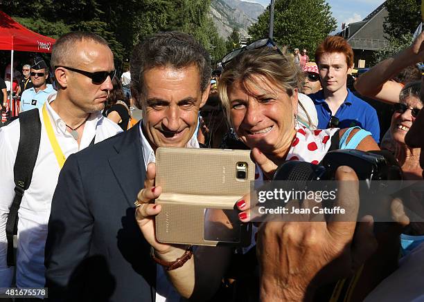Former French President Nicolas Sarkozy attends stage eighteenth of the 2015 Tour de France, a 186.5 km stage from Gap to Saint Jean de Maurienne on...