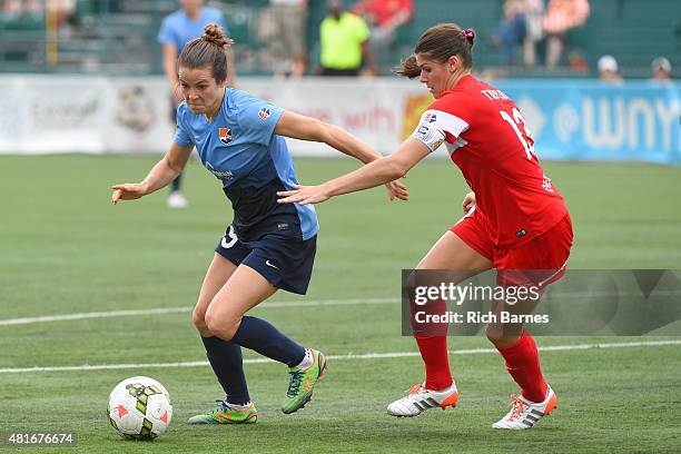 Kelley O'Hara of the Sky Blue FC controls the ball against the defense of Brittany Taylor of the Western New York Flash during the second half at...