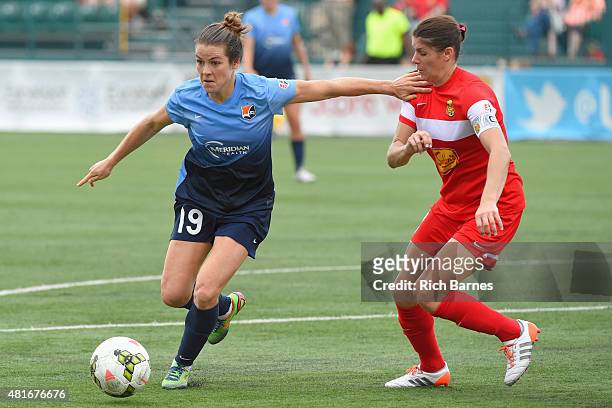 Kelley O'Hara of the Sky Blue FC controls the ball against the defense of Brittany Taylor of the Western New York Flash during the second half at...