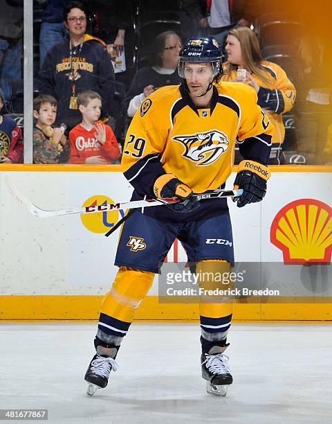 After playing 387 minor league games thirty-year old Mark Van Guilder of the Nashville Predators skates during warm ups prior to his first career NHL...