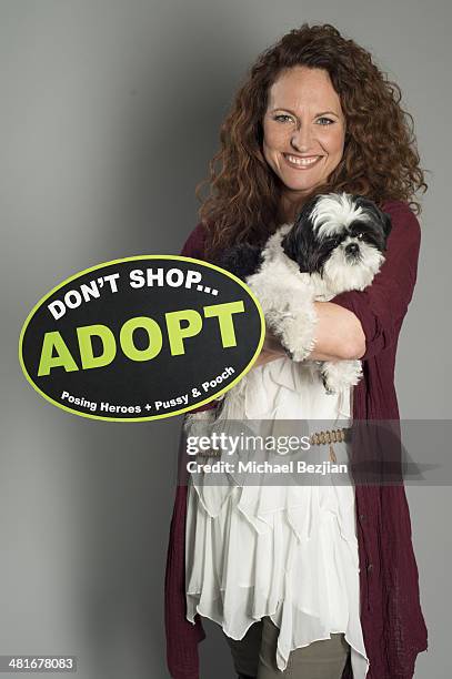 Television personality Jerri Manthey poses for Portraits For Pooches on March 30, 2014 in Beverly Hills, California.