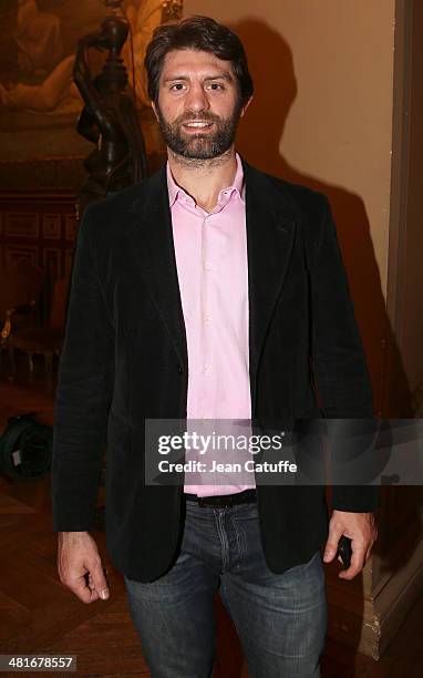 Rugby player Pierre Rabadan celebrates the victory of the newly elected Mayor of Paris Anne Hidalgo at City Hall on March 30, 2014 in Paris, France.