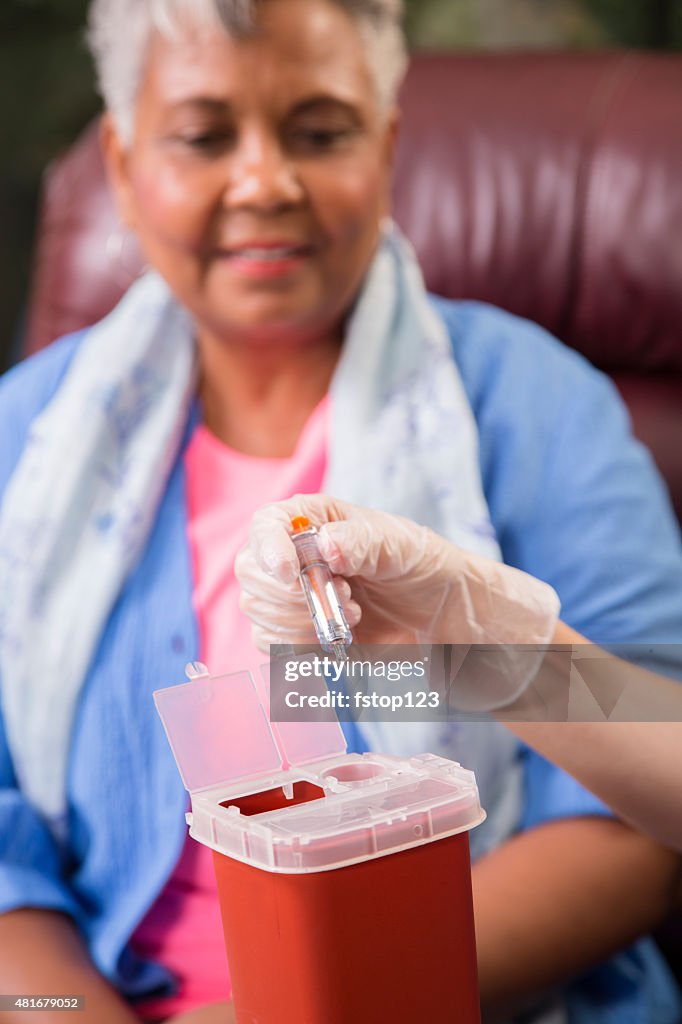 Nurse demonstrating proper disposal of medications, syringes.