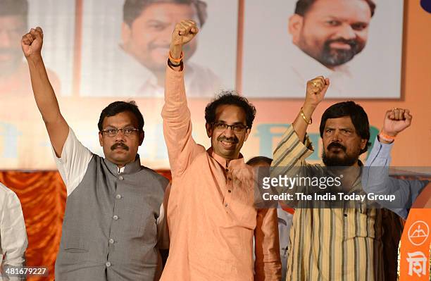 Leader of Opposition in Maharashtra Legislative Council and BJP member Vinod Tavade, Shiv Sena president Uddhav Thackeray and RPI supremo Ramdas...