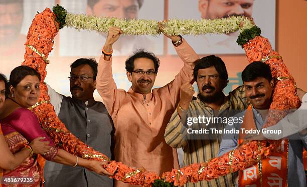 Leader of Opposition in Maharashtra Legislative Council and BJP member Vinod Tavade, Shiv Sena president Uddhav Thackeray and RPI supremo Ramdas...