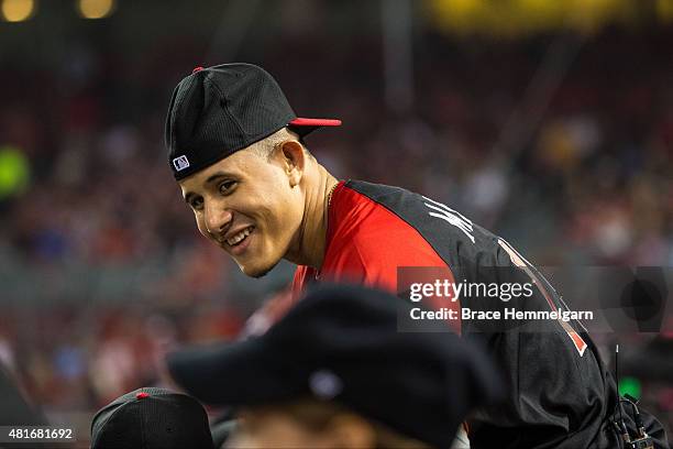 American League All-Star Manny Machado of the Baltimore Orioles smiles during the Gillette Home Run Derby presented by Head & Shoulders at the Great...