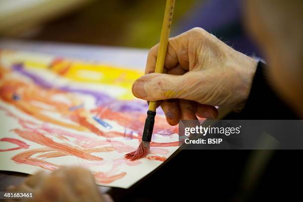 Reportage on art therapy in the Emilie de Rodat retirement home in Rueil Malmaison, France. This retirement home houses people suffering from...