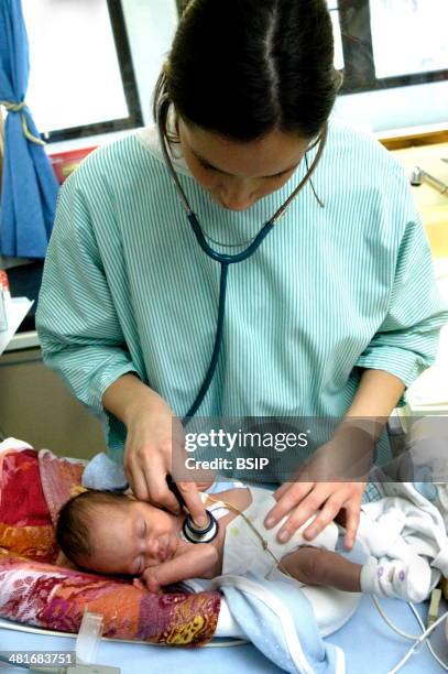 Reportage in the neonatal unit of Robert-Debre hospital in Paris, France. Examination by a pediatrician.