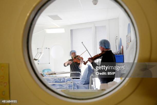 French N.G.O. Musique et Sante . Music therapy in children's ward.