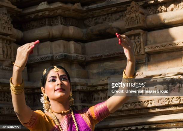 Dancer performing Bharatnatyam in Khajuraho Dance Festival, Khajuraho, Chhatarpur District, Madhya Pradesh, India.