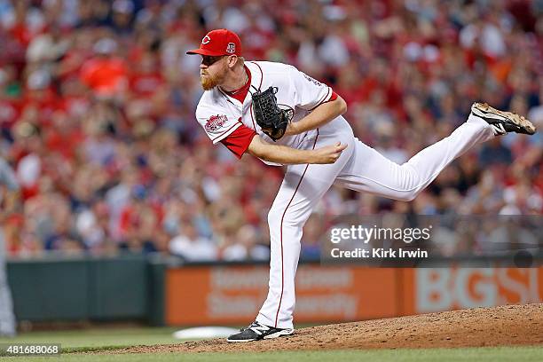 Nate Adcock of the Cincinnati Reds throws a pitch during the game against the Cleveland Indians at Great American Ball Park on July 18, 2015 in...