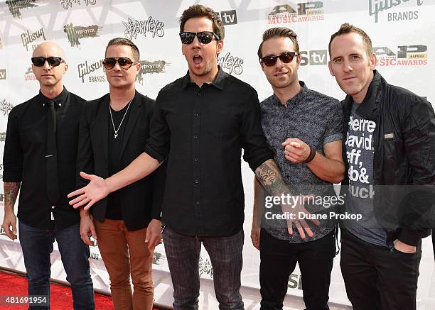 Jeff Stinco, David Desrosiers, Pierre Bouvier, Sébastien Lefebvre, and Chuck Comeau of Simple Plan attend the 2015 Journeys AP Music Awards, Fueled...