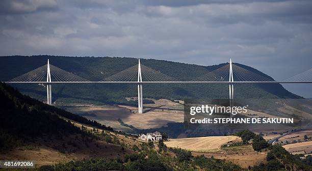 This picture taken on July 23, 2015 shows a general view of the Millau viaduct in Millau, southwestern France. AFP PHOTO / STEPHANE DE SAKUTIN