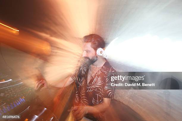 Jack Guinness DJs at the Amazon Fashion Photography Studio launch party, which opened on July 23, 2015 in London, England. Guest of honour was Suki...