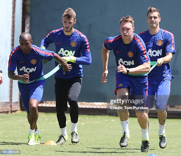 Ashley Young, David de Gea, Phil Jones and Morgan Schneiderlin of Manchester United in action during a first team training session as part of their...