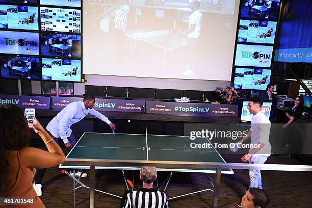 Bernard James of the Dallas Mavericks and Courtney Lee of the Memphis Grizzlies during the 2015 Top Spin Celebrity Ping Pong Tournament hosted by Los...