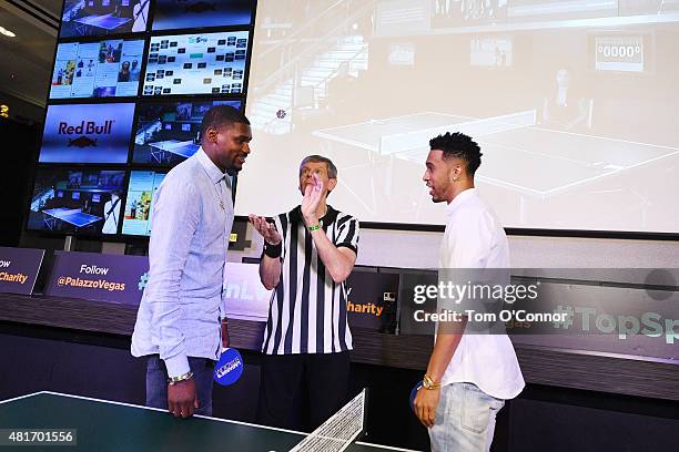 Bernard James of the Dallas Mavericks and Courtney Lee of the Memphis Grizzlies during the 2015 Top Spin Celebrity Ping Pong Tournament hosted by Los...