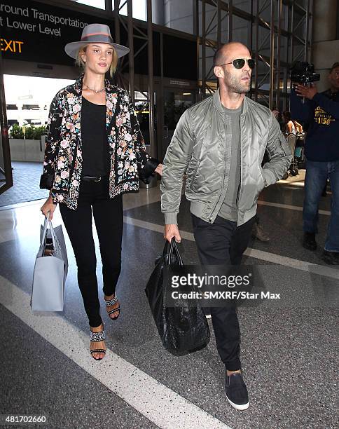 Actor Jason Statham and Rosie Huntington-Whiteley are seen on July 23, 2015 in Los Angeles, California.