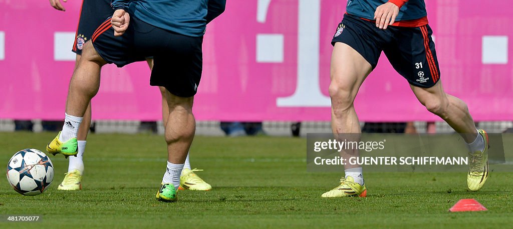 The calves of Bayern Munich's Swiss midfielder Xherdna Shaqiri and