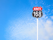vintage route 168 road  sign and blue sky