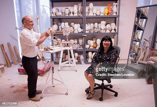 Sculptor Michael Evert creates a sculpture of designer Anna Sui as part of the Ralph Puccu: The Art of the Mannequin exhibit at Museum of Arts and...
