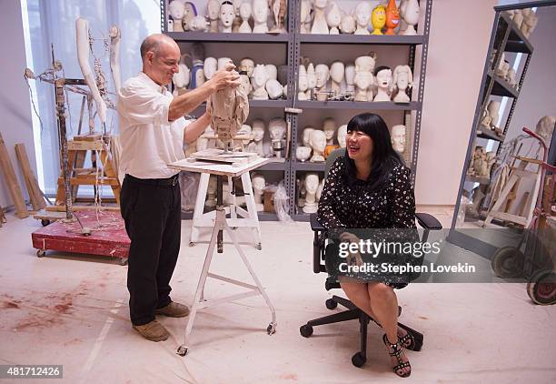 Sculptor Michael Evert creates a sculpture of designer Anna Sui as part of the Ralph Pucci: The Art of the Mannequin exhibit at Museum of Arts and...