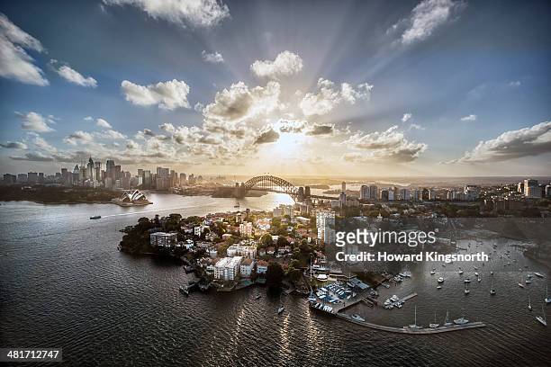 aeriall view of sydney harbour at sunset - sydney stock pictures, royalty-free photos & images