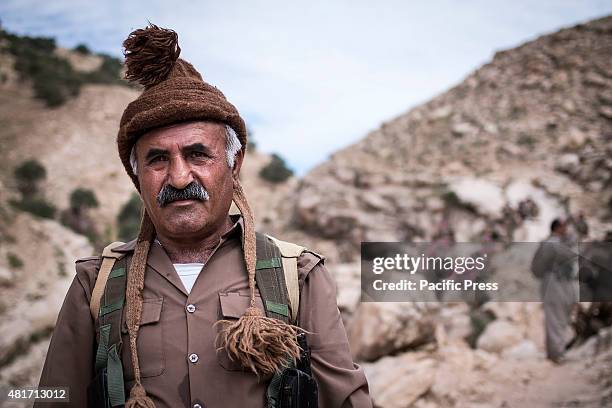 Peshmerga poses during rest time. Peshmergas were trained on the mountains for survival and endurance, to prepare themselves for war.