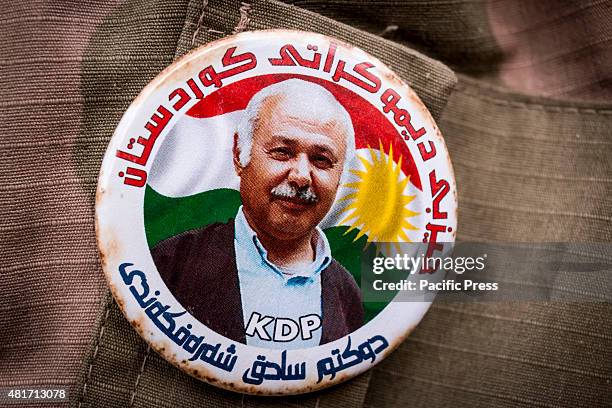 Pin with the face of Sadegh Sharafkandi worn by a peshmerga. Sharafkandi was a Kurdish political activist and the Secretary-General of the Kurdistan...