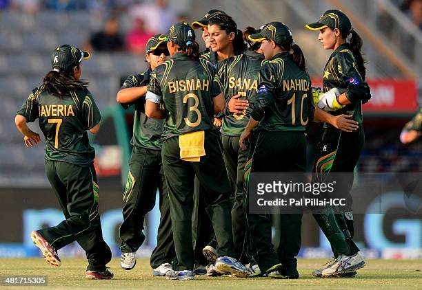 Asmavia Iqbal of Pakistan celebrates the wicket of Mary Waldron of Ireland during the ICC Women's World Twenty20 match between Pakistan Women and...
