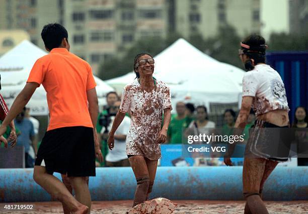 Players in action during a game of 2015 Swamp Soccer China at Yuetan gymnasium on July 23, 2015 in Beijing, China. Thirty-two teams take part in 2015...