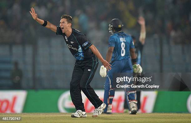 Trent Boult of New Zealand successfully appeals for the wicket of Kusal Perera of Sri Lanka during the ICC World Twenty20 Bangladesh 2014 Group 1...