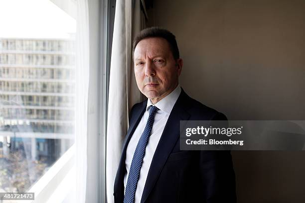 Yannis Stournaras, Greece's finance minister, poses for a photograph following a Bloomberg Television interview at the Ministry of Finance offices in...