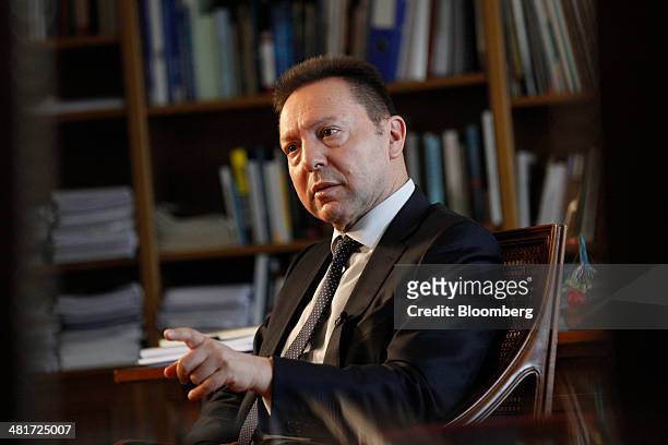 Yannis Stournaras, Greece's finance minister, speaks during a Bloomberg Television interview at the Ministry of Finance offices in Athens, Greece, on...