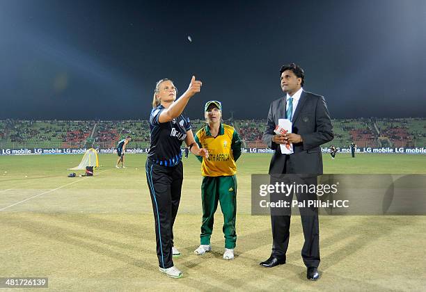 Suzie Bates captain of New Zealand , Mignon Du Preez captain of South Africa and ICC match referee Javagal Srinath during the toss before the start...