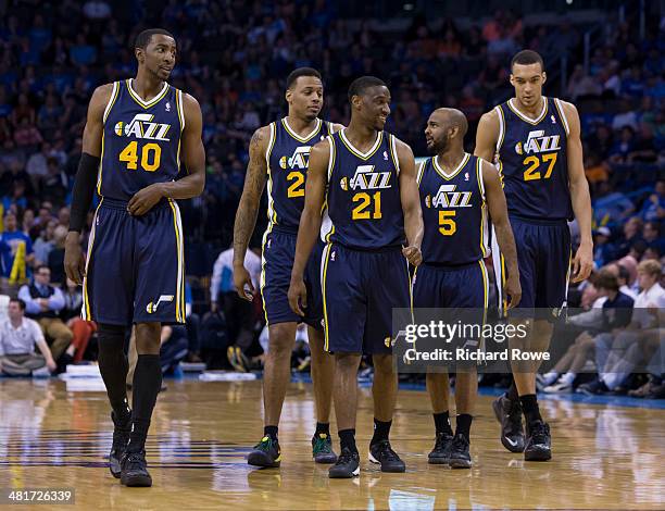 Jeremy Evans, Ian Clark, John Lucas III and Rudy Gobert of the Utah Jazz walk onto the court against the Oklahoma City Thunder at the Chesapeake...