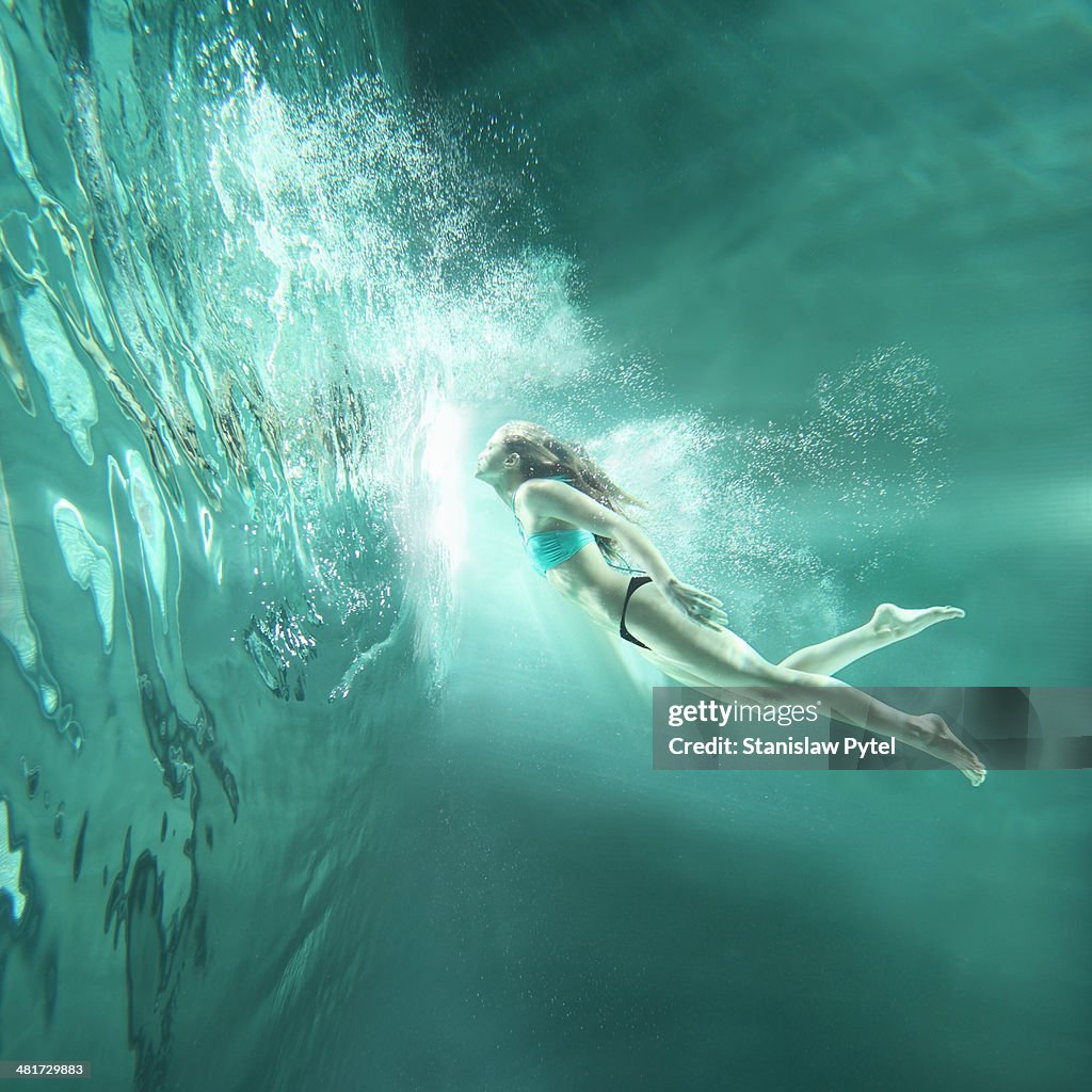 Girl flying underwater