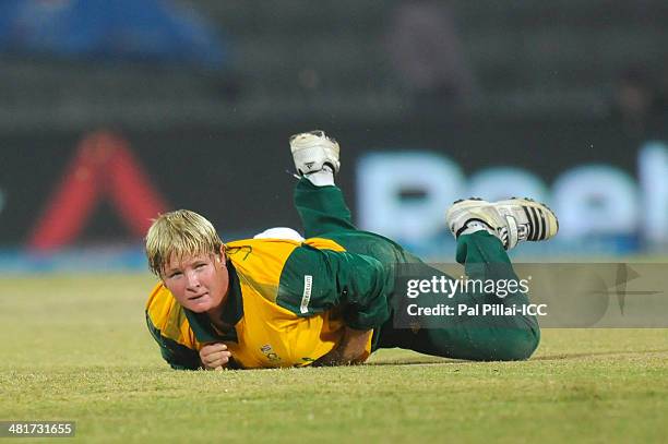 Sunette Loubser of South Africa looks on as she fails to stop a ball of her own bowling during the ICC Women's World Twenty20 match between New...