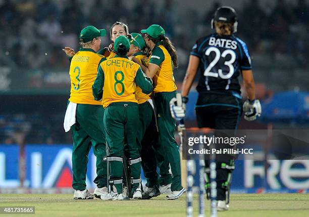 Dane Van Niekerk of South Africa celebrates the wicket of Suzie Bates captain of New Zealand during the ICC Women's World Twenty20 match between New...