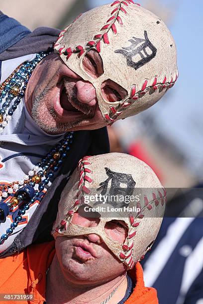 Fans pose on Opening Day before the game between the Kansas City Royals and the Detroit Tigers at Comerica Park on March 31, 2014 in Detroit,...