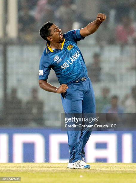 Rangana Herath of Sri Lanka celebrate a wicket during the Sri Lanka v New Zealand match at the ICC World Twenty20 Bangladesh 2014 played at Zahur...
